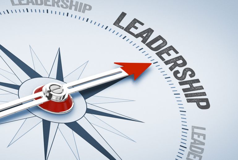Kompass zeigt auf Leadership